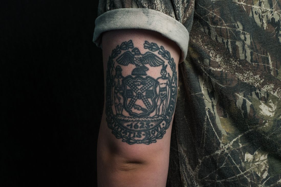 William Warren also got a tattoo of the seal of New York, by Rob Banks, after he moved to Maine<br>